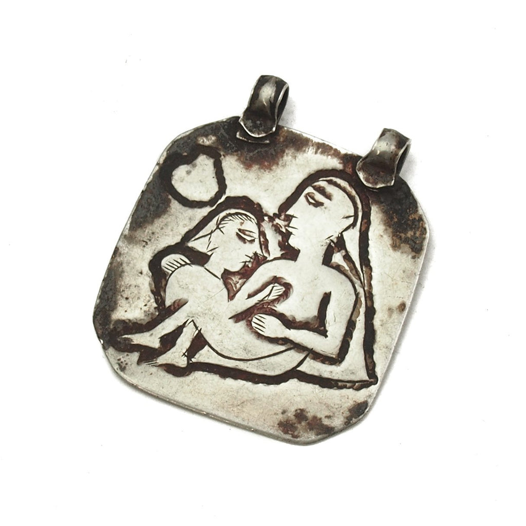 Kama Sutra Silver Amulet
