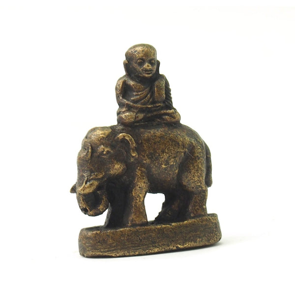 Monk Atop Elephant Statue