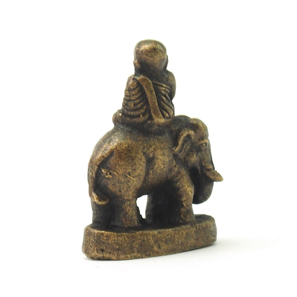 Monk Atop Elephant Statue