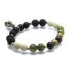 Lavastone, Onyx, White Coral, Red and Green Garnet Beads Elastic Bracelet with Silver Accents and Sterling Silver Ganesh Amulet