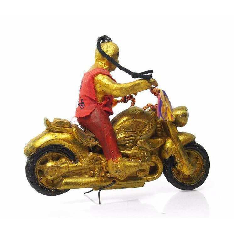 Kuman Thong Figure 4 Driving His Protective Motorcycle