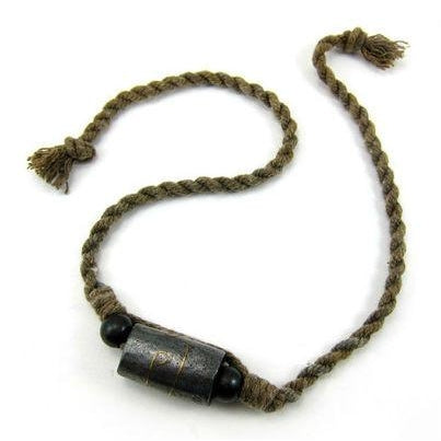 Prayer Bead "Takrut" in Iron with Inlaid Brass Inscription